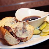 French Dip · Sliced prime rib with melted provolone cheese served with au jus.