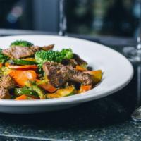 Stir-Fry · An assortment of hand cut vegetables tossed with our homemade sauce, served over your choice...