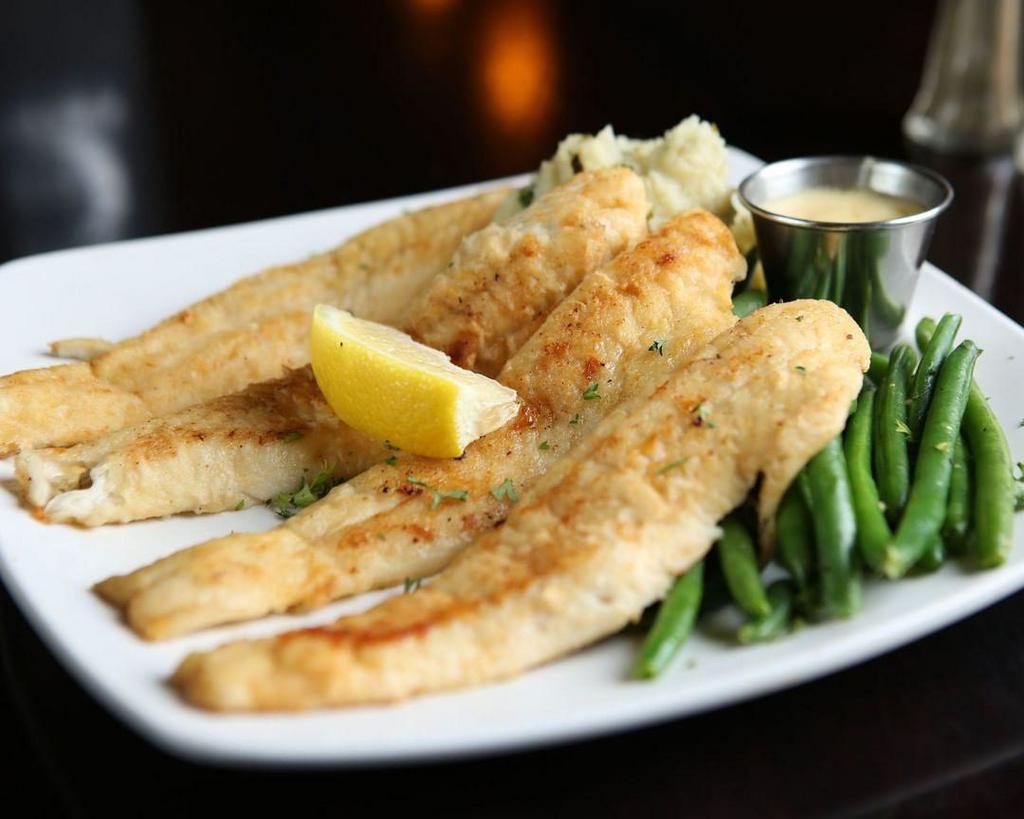 Sauteed Lake Perch · Fresh lake perch sauteed and lightly breaded. Served with a side of lemon butter caper sauce.