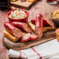 Smoked Jalapeno Cheddar Sausage (Platter) · Jalapeño Cheddar Sausage, smoked in-house. Served with a choice of two sides and a cornbread...
