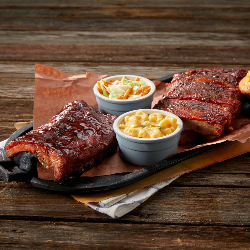St. Louis Rib and Baby Back Combo · Create your own full slab. Pair up any two of the following:  1/2 slab St. Louis-Style Spareribs (6 bones), 1/2 slab  Original-Style Baby Back Ribs or 1/2 slab Memphis-Style Baby Back Ribs  (590 cal.). Served with a choice of two sides and a cornbread muffin.
