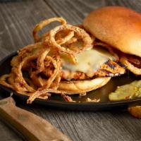 Cajun Chicken Sandwich · Roasted, pulled chicken tossed in rich, sassy, and topped with melted Monterey Jack cheese. ...