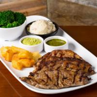 Picanha · Grilled Picanha (12 oz) served with Chimichurri sauce and Guasacaca. Served with two sides a...
