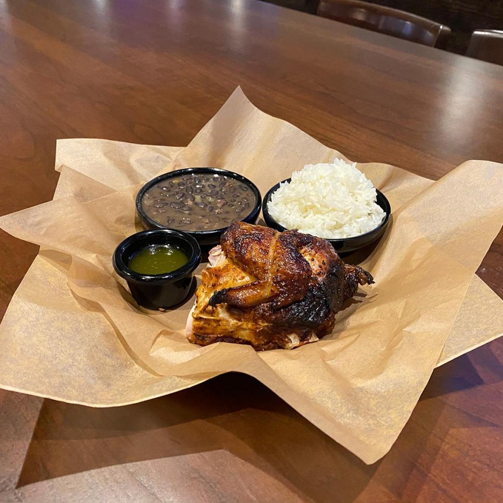 1/4  Rotisserie Chicken · Our delicious Rotisserie Chicken (Pollo en Brasa) is rubbed with our blend of herbs and spices and slow-roasted, until it’s juicy and tender. Served with two sides and Garlic Mojo sauce. 