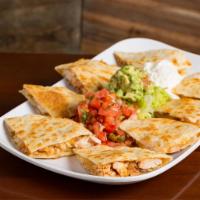 Quesadillas · Flour tortillas stuffed with 3-cheese blend, Dave's spices and your selection of Churrasco, ...