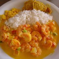 Moqueca de Camarão / Shrimp stew · Prato feito de peixe, arroz, pirao,/  Shrimp stew. Dish made offish, rice, mush, 