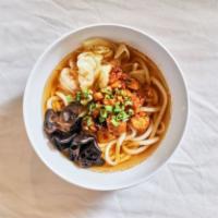 Seoul Udon Soup · contains gluten, soy, sesame, and fish. a hearty noodle soup with gochujang chicken, seasone...