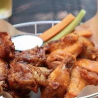 Bone-In Wings · Choice of buffalo, BBQ, sweet and spicy, habanero BBQ ranch or blue cheese.