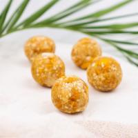 Tropical Bites · Honey, Cashews, Mango, Coconut Flakes, Lemon,
Vanilla Extract, Himalayan Salt, Water