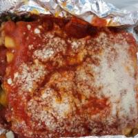 C Ruff's Lasagna · Ground beef and Italian sausage lasagna, cheddar, parmesan, feta, and mozzarella cheeses. Se...