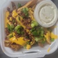 Small Loaded Fries · Fresh cut fries, cheese, bacon, sour cream, green onions, 