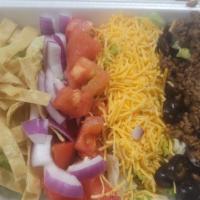 Taco Salad · Seasoned ground beef on a bed of lettuce, tomato, black olive, onion, cheddar cheese, pico d...