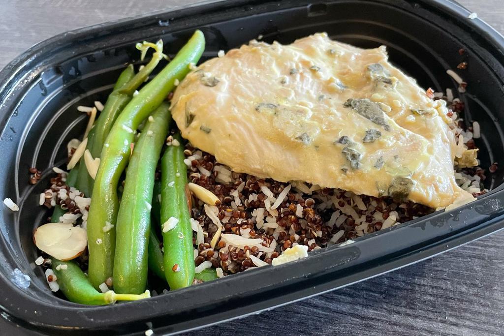 #78 Garlic Lemon Basil Chicken · Our Marinated Roasted Garlic Lemon Basil Chicken served with Basmati Rice Quinoa spinach and green beans and toasted almonds