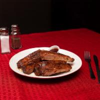 BBQ Ribs · St. Louis style with KC BBQ sauce. 