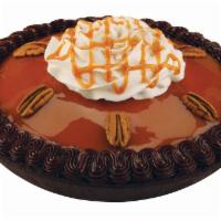 Turtle Pie · Turtle pie - pralines 'n cream ice cream topped with caramel praline, chocolate pie crust.