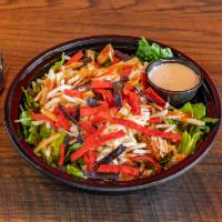Buffalo Chicken Salad · House salad blend, grilled chicken breast, Buffalo sauce, shredded cheese, and tortilla stri...