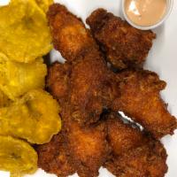 Regular Chicken Wings with Fries or Fried Plantains · 