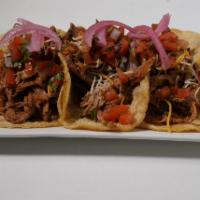 Pulled Pork Tacos · Smoked pork tacos (3) with pico de gallo, pickled red onion, cheese on corn tortillas.