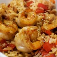 Ragin Cajun Shrimp Bowl · With onions, red bell peppers and sizzling Cajun shrimp.