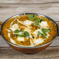 Palak Paneer · Creamed spinach cooked delicately with cheese cubes. Vegetarian