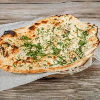 Garlic Naan · Leavened bread lightly sprinkled with garlic