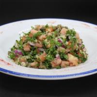 Quinoa Tabule Salad · Quinoa, tomatoes, parsley, mint, green mix.