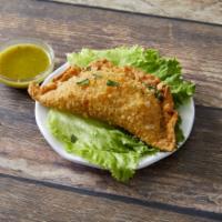 Golden Cheese Empanadas · Crispy pastry stuffed with cheese and chicken