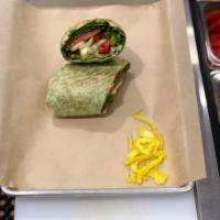 Veggie Wrap · Spinach wrap with hummus, mixed greens, cucumbers, peppers, tomatoes, balsamic vinaigrette a...