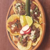 3. Street Tacos · 4 pieces. Carne asada, carnitas, barbacoa, lengua, alpastor, tripa, buche, chorizo, chicken.