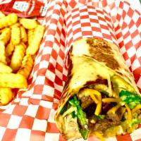 Wrap Shawarma Steak, Chicken and fries · Arugula, Humus, Garli Sauce, Cheese, Avocato