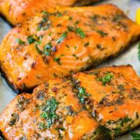Grilled Salmon · Fresh Grilled Salmon grilled to perfection. Served with our fresh cut potato fries and a sid...