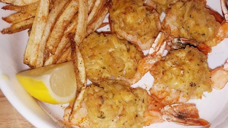 Stuffed Jumbo Shrimp  · 5 Jumbo shrimp stuffed with a whole crab cake. with fresh cut fries.