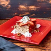 Chocolate Tres Leches  · Traditional chocolate tres leches cake topped with chocolate sauce, strawberries, and whippe...