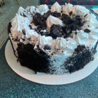 Oreo Cheesecake · Oreo Cookie baked inside the Cheesecake and on the Outside. It's one of our top selling cake...