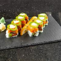 Green Point Roll  · 8 pieces. Tuna, salmon, avocado, spicy yellowtail and jalapeno on top.