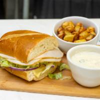 Turkey Sandwich Combo · Swiss cheese, lettuce, red onion, and spicy mayo. Includes homemade chips.