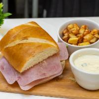 Ham Sandwich Combo · Swiss cheese, lettuce, red onion, and spicy mayo. Includes homemade chips.