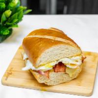 Breakfast Sandwich · 2 eggs with a choice of cheese, and choice of protein.
