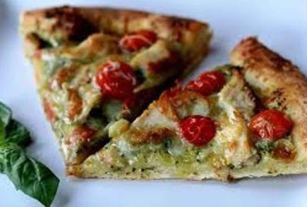 Chicken Pesto Pizza · Pesto sauce, grilled chicken, tomatoes, roasted red peppers, red onions and mozzarella cheese.