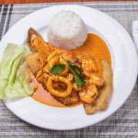 Pescado a lo Macho · Fried fish and seafood served in a Peruvian sauce with rice.