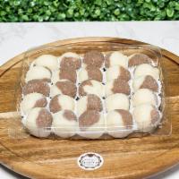 Box of 25 Units of Mini Casadinhos Truffles · Milk and white Belgian chocolate brigadeiro covered with crystal sugar. 25 grams each truffl...