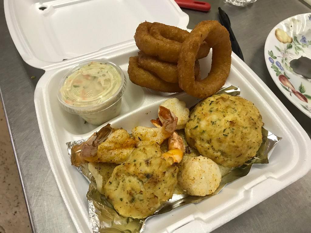 Seafood Combo Platter · Crab cake, fish fillet, 2 scallops, 2 fried shrimp, 1 jumbo stuffed shrimp.