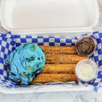 ChurroNieve / churro with scoop of ice cream · Traditional mexican churro and scoop of ice cream topped with lechera & hersey chocolate 