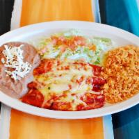 Enchiladas · served with rice, beans and salad. 