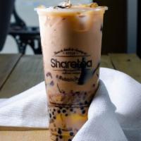 QQ Happy Family Milk Tea QQ全家奶茶 · Assorted toppings included. Pearls, mini pearls, lychee jelly, red bean, herb jelly, and pud...