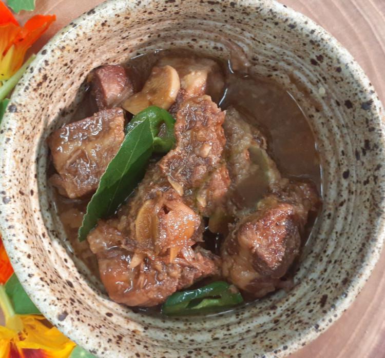 Pork Adobo · Tender pork shoulder stewed with chile, garlic, and tamari. Gluten-free, dairy-free.