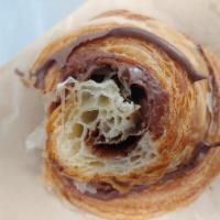 Chocolate Hazelnut Croissant · Our made from scratch in house croissant filled with chocolate hazelnut cream.