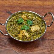 Saag Paneer Curry · Spinach cooked with homemade cheese.