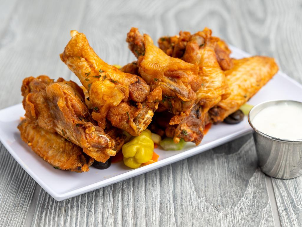 11. Buffalo Chicken Wings · Eight colossal wings with celery and bleu cheese. 