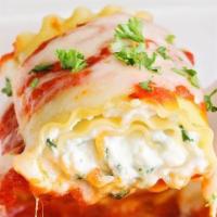 106. Cheese lasagna roll · Ricotta cheese stuffed pasta in marinara sauce with melted mozzarella. Served with Caesar sa...